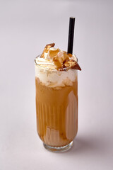 Delicious Iced Coffee Beverage with Whipped Cream and Caramel Drizzle, Perfectly Crafted for...