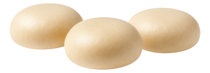 Smooth millet porridge served in a minimalist white bowl, garnished with slivered almonds for added texture.