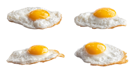 A delicious and simple breakfast of four perfectly fried sunnyside up eggs on clean white ceramic plate, classic nutritious meal to start the day.