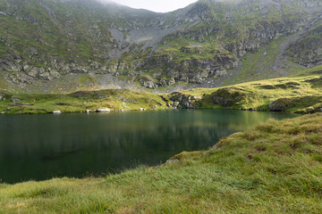 Fototapeta premium fagaras mountains with Capra lake