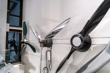Classic wooden and metal aircraft propellers on display at the Deutsches Museum in Munich. Propeller designs vary according to the evolution of aircraft technology. Germany
