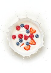 Yogurt with fresh berries in milk splash