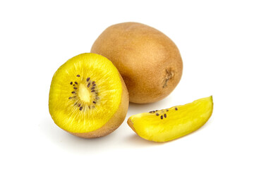 Fresh golden kiwi fruit, whole and sliced, showcasing vibrant yellow flesh and tiny black seeds,...