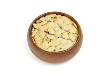 Bowl filled with raw pumpkin seeds, showcasing their natural texture and color, arranged neatly for culinary use, emphasizing healthy snacking and nutritious options