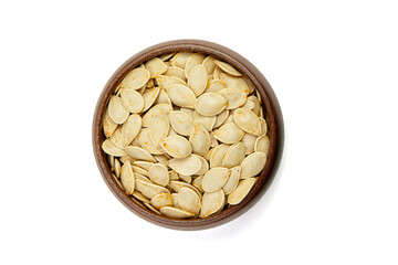 Bowl filled with raw pumpkin seeds, showcasing their light brown color and smooth texture, surrounded by a clean white background for a fresh and natural presentation