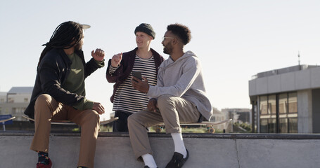 Happy men, skateboard or phone with friends for social media, network or connection in city. Male people, group or community with mobile smartphone for spot or bonding together in an urban skate park