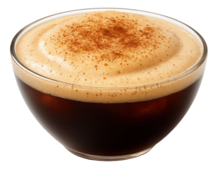 Compact glass jar of sparkling chai tea concentrate, with spices visibly suspended in the liquid.