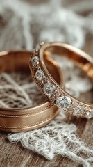 Elegant golden wedding rings arranged on delicate lace with a rustic wooden background capturing the essence of love and commitment