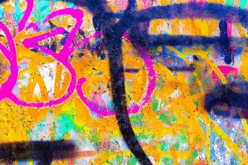 Neon graffiti wall texture in vibrant pink, orange, blue. Dynamic 90s, Y2K street art look, bold patterns. Posters, digital art, header, modern 2000s, y2k creative banner, urban visuals.
