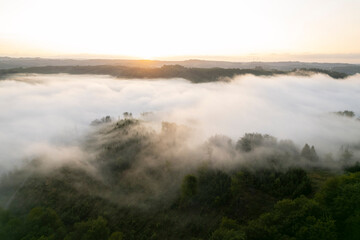 Rural Landscape with Sunrise and Light Fog

