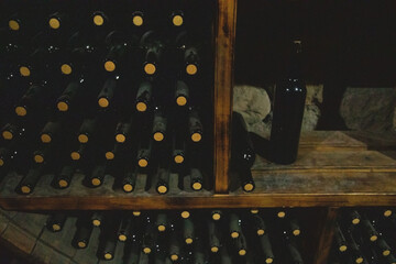 Wine bottles in a old warehouse. Wine storage