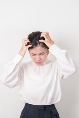 Business woman having itchy Scalp and Head hair, Dandruff, Dry Scalp, Skin Allergy Seborrheic dermatitis. Dermatology, Leprosy day, Systemic lupus erythematosus, SLE, Psoriasis and Atopic Eczema rash