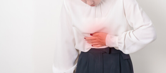 Business woman having abdomen aches for Stomach pain, digestion with constipation or Diarrhea from food poisoning, female problem and Endometriosis, Hysterectomy, Stomachache and Menstrual concept