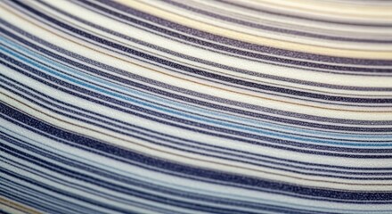 Close up of flowing striped pattern in shades of blue and white creating a modern and elegant design
