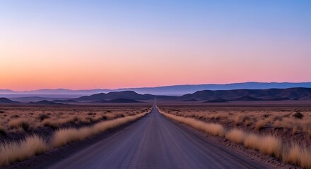 Fototapeta premium Photo of desert road leading to the horizon at sunset