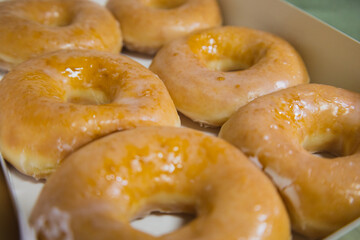 top view side view golden fresh donuts with sugar sweet glaze in box many delicious donuts