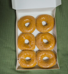 top view side view golden fresh donuts with sugar sweet glaze in box many delicious donuts