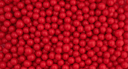 Dense aggregation of vibrant red spheres creating a visually striking texture and pattern forming