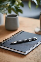 clean desktop with refillable notebook and eco pen
