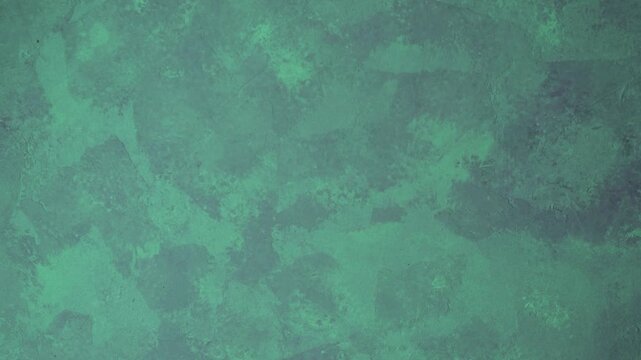 This abstract background features a vibrant green and teal painted texture, showcasing a distressed surface with organic brushstrokes for a dynamic visual effect.