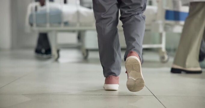 Walking, hallway and feet of doctor in hospital for treatment, medical service and operation. Healthcare, surgeon and back of person in clinic for surgery prep, wellness and career in passage