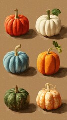 Collection of decorative pumpkins in various colors displayed on a textured background