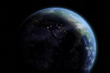 Blue planet Earth at Night. The planet Earth appearing from the darkness of outer space. Space...
