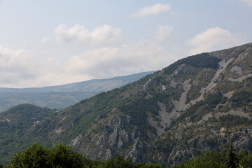 Naklejka premium Mountain landscape with cloudy sky. Travel through Provence and the Maritime Alps
