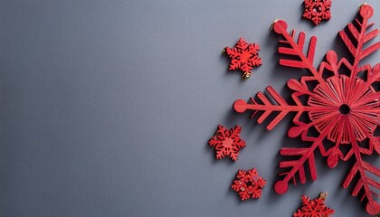Wooden red snowflake decorations on gray background with copy space. Generated image
