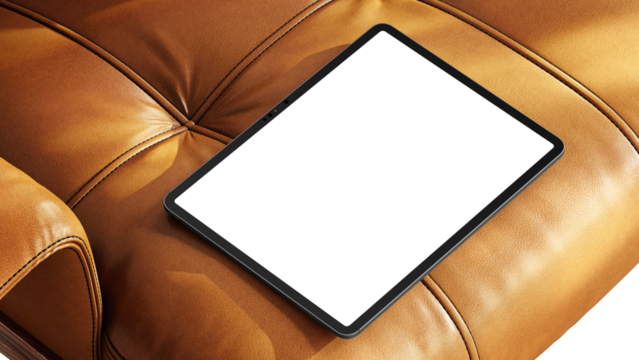 Blank tablet screen resting on a leather chair with soft shadows for web design and UX/UI presentation.
