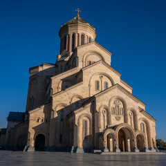 Fototapeta premium Holy Trinity Cathedral of Tbilisi is also know as Sameba Cathedral. Its neo-Byzantine architecture features a golden dome and impressive scale, reflecting Georgian religious revival.