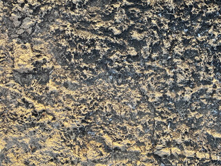 Grungy and Porous Texture of an Old Stone