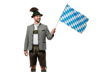PNG cut out isolated background. A full-length portrait of a proud man in full, traditional Bavarian attire, including lederhosen and a hat, smiling while waving the blue and white checkered flag.