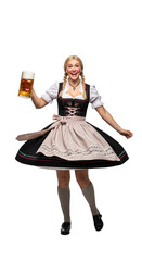 PNG cut out isolated background. A full-length portrait of a happy young woman in a traditional Bavarian dirndl dress, holding a large glass mug of beer to celebrate Oktoberfest.