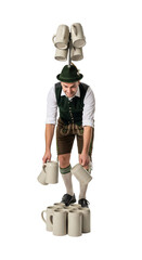PNG cut out isolated background. A full-length portrait of a waiter wearing traditional Bavarian lederhosen, with his face obscured by a large tray he is carrying that is loaded with glass mugs.