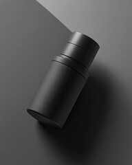 Sophisticated black container product shot on a monochromatic backdrop