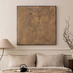 Minimalist set up of bedroom arrangement with mock up art work, tea pot and personal accessories. Home decor.