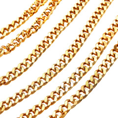 Obraz premium Shiny Gold Chains Displayed With Dark Background for Luxury Appeal