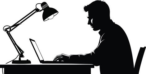 Silhouette of a man working on a laptop under a desk lamp in a high contrast black and white image