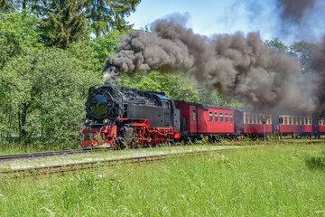 Brockenbahn Steam train locomotive railway on Brocken mountain in Germany
