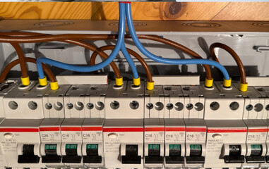 Circuit breaker symphony, choreographed wires dance, National Electric Safety Month, tech harmony,...