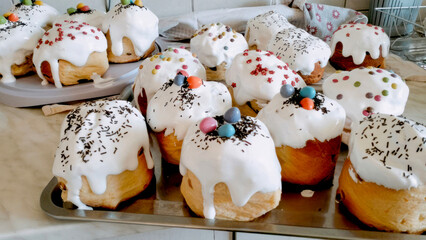 Sweet Easter kulich crowned with whimsical icing drips and pastel beads, capturing Orthodox celebrations and Slavic springtime traditions