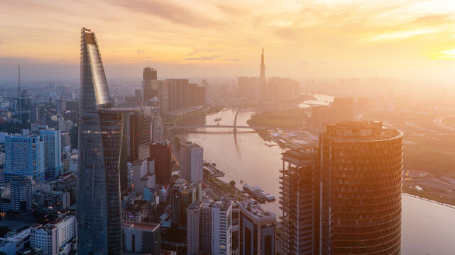 Aerial view of early morning in Ho Chi Minh City, Vietnam with development buildings, transportation, energy power infrastructure. Financial and business centers