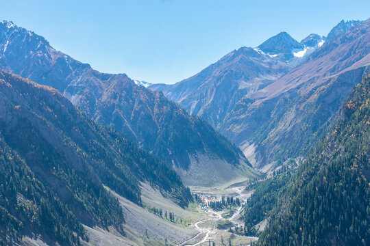 Scenic Himalayan landscape with a glacier and flowing mountain streams along the Baltal route during the annual Amarnath Yatra in Jammu and Kashmir, India.