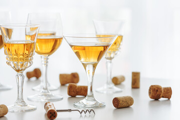 Set of glasses of yellow wine at wine tasting