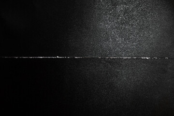 black folded paper texture background