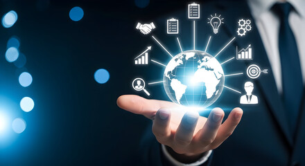 Businessman holding glowing earth with global business growth icons symbolizing success and strategy