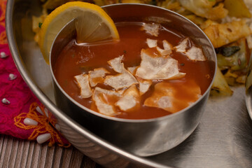 South Indian lemon tomato rasam soup