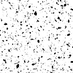 Vector depicting a scattered array of irregular black shapes against a stark white backdrop in a seamless pattern minimilist