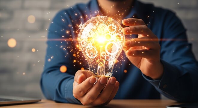 Businessman's hands gently cradling a glowing light bulb filled with intricate golden gears radiating bright sparks